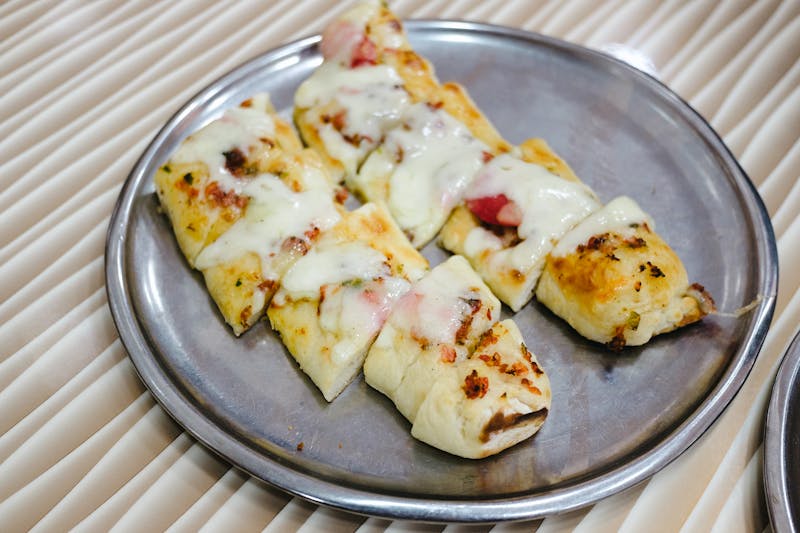 Cheesy Breadsticks with garlic butter and melted cheese