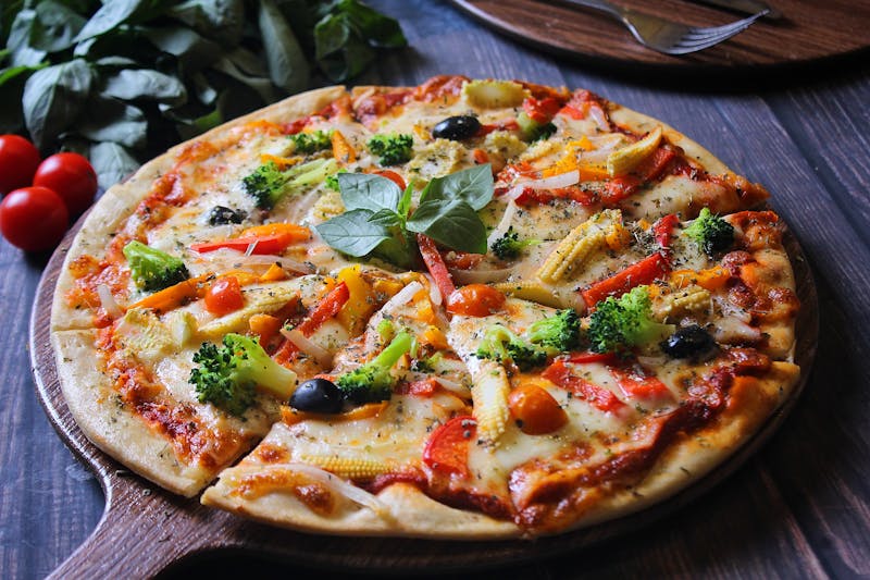 Margherita Classica pizza with fresh basil and buffalo mozzarella