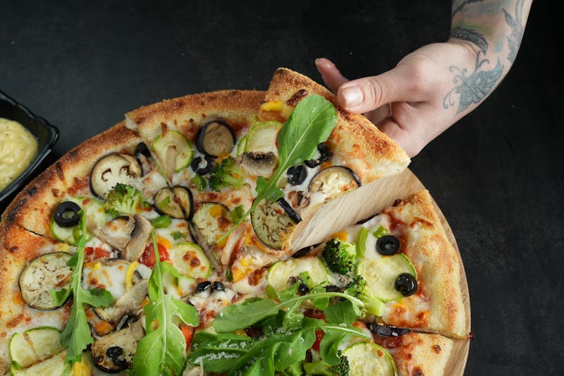 Veggie Supreme pizza with colorful fresh vegetables